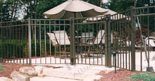 Landing Outside of Swimming Pool Area Showing Aluminum Pool Gate and Fence