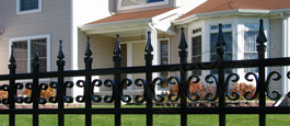 Castile Commercial Fence With Decorative Butterfly Scrolls and Finials